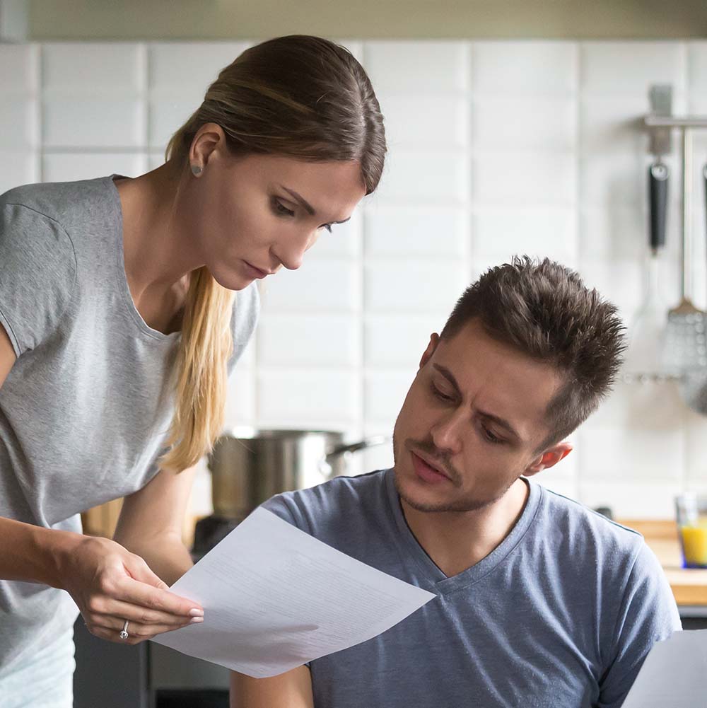 woman showing man estate plan